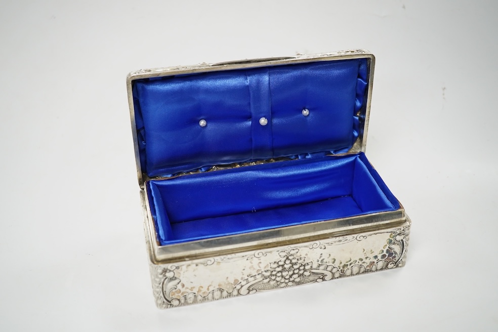 A late Victorian embossed silver rectangular trinket box (converted from a cigarette box), Joseph Braham, London, 1900, 17.5cm. Condition - fair to good